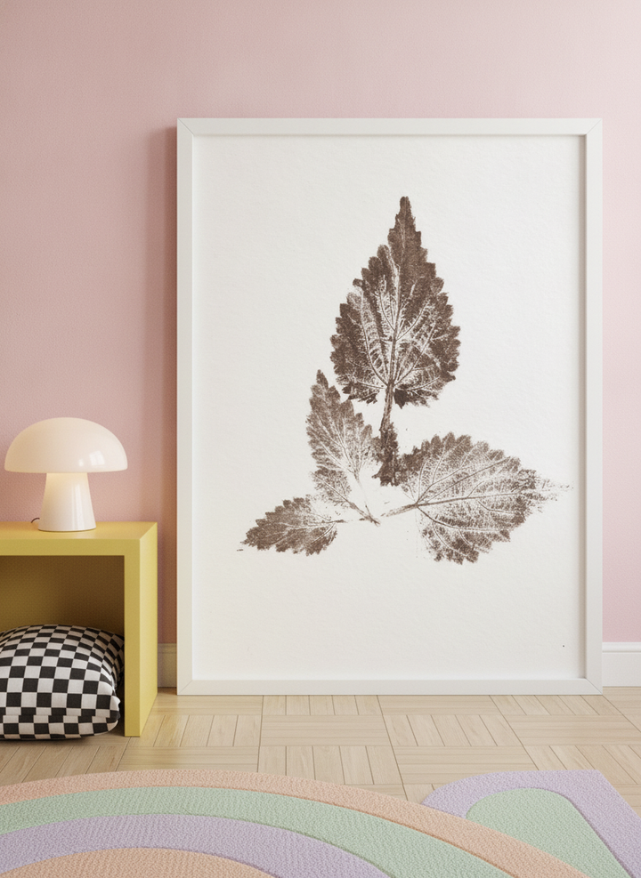 Modern wall art print standing on a side table in a colourful eclectic bedroom