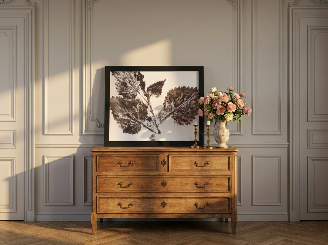 Modern wall art print standing on a sideboard in a Parisian bathroom