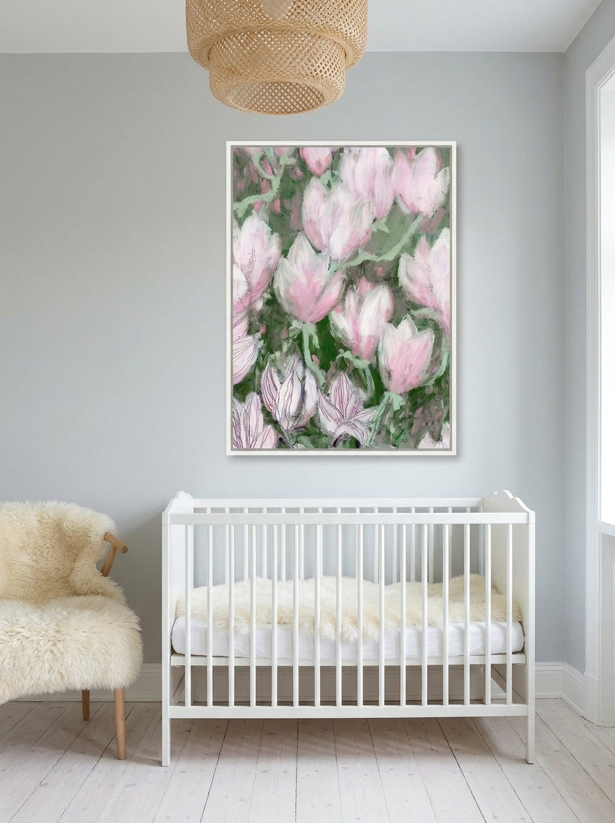 Canvas wall art with a white surround styled on the wall in a bright Scandinavian nursery