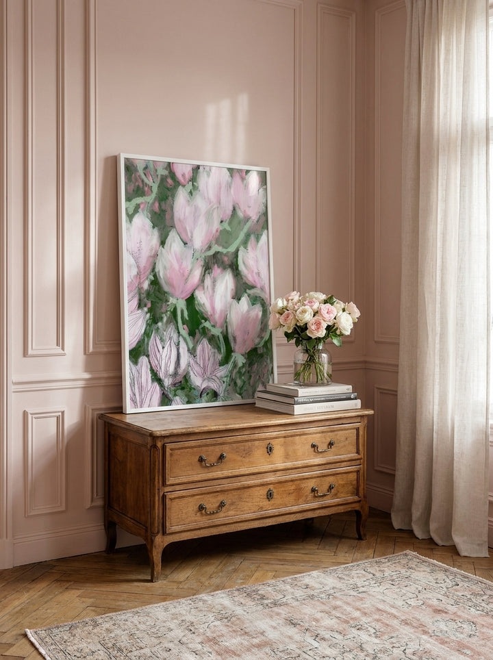 Modern wall art print standing on a sideboard in a Parisian bedroom