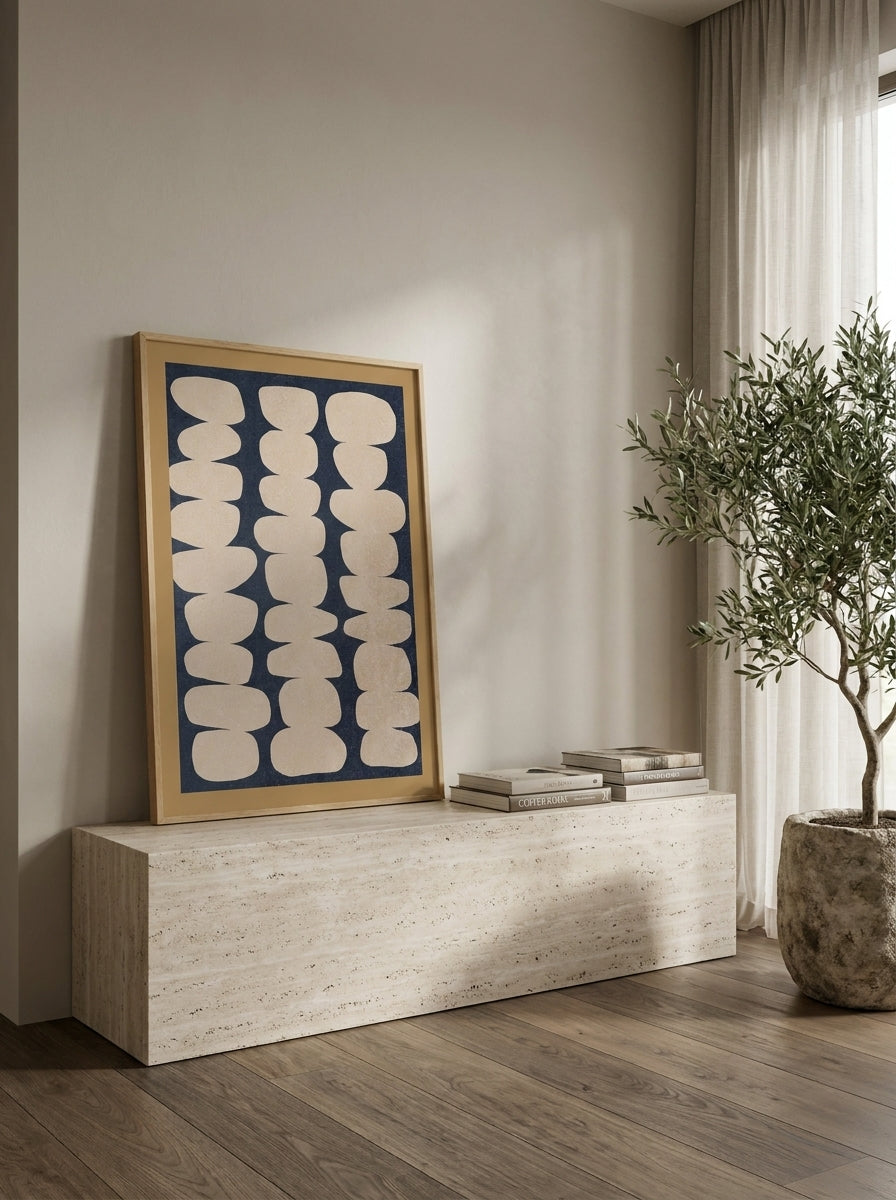 Modern wall art print standing on a console in a luxe bathroom