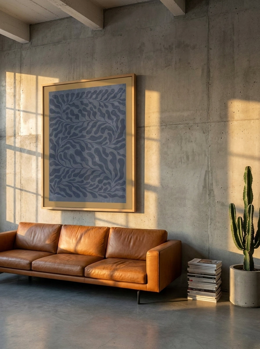 Oversized statement modern wall art print styled on the wall in an industrial loft living room