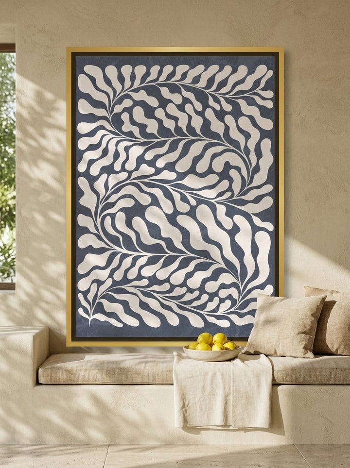 Canvas wall art with a gold leaf surround styled on the wall in a Mediterranean living room