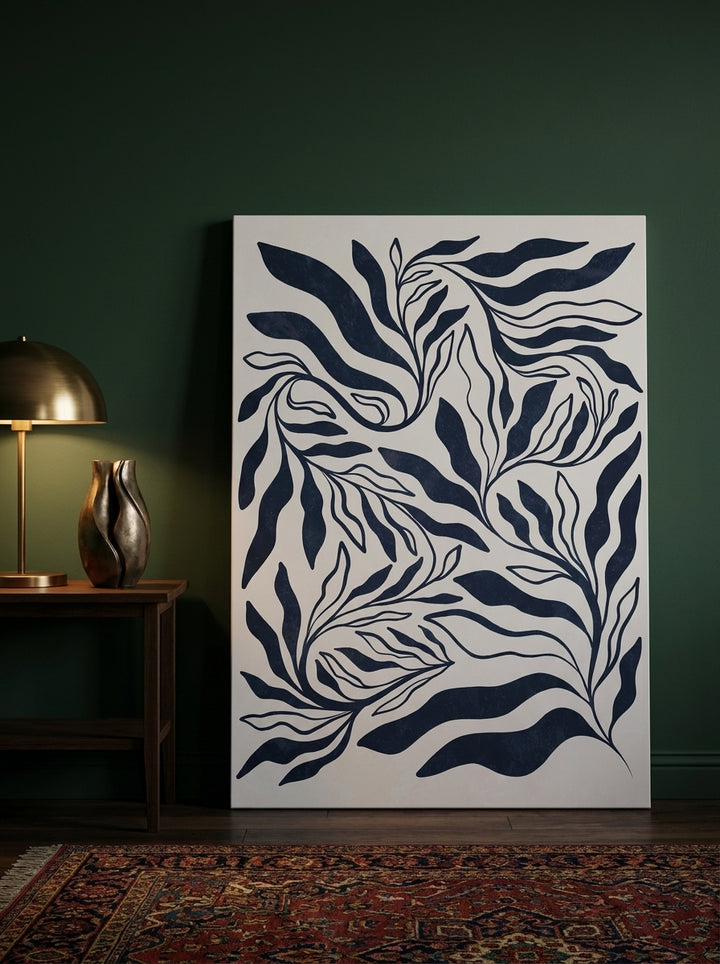 Stretched canvas wall art leaning against the wall in a moody bedroom