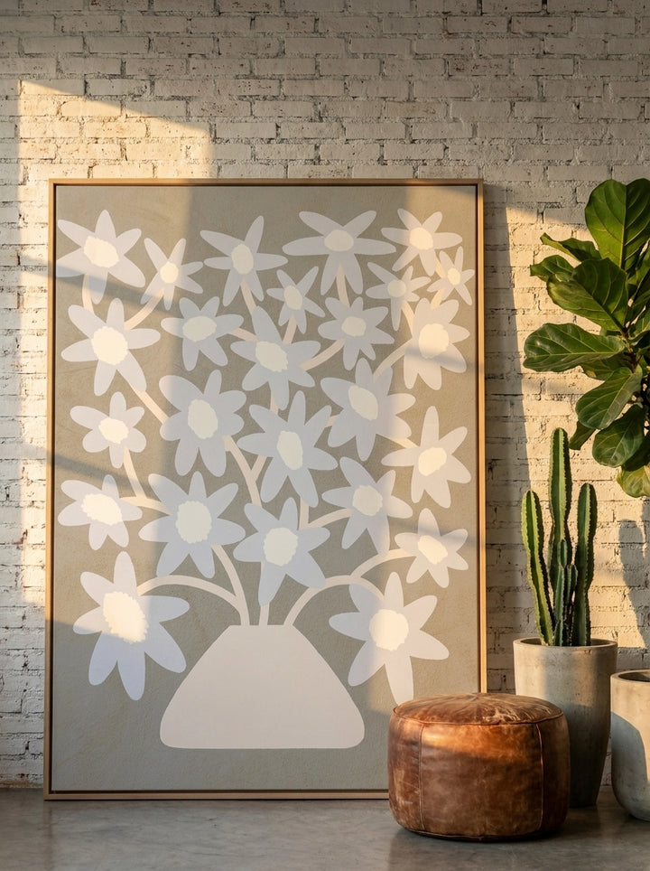Oversized statement canvas wall art with a natural timber surround leaning against the wall in an industrial loft living room