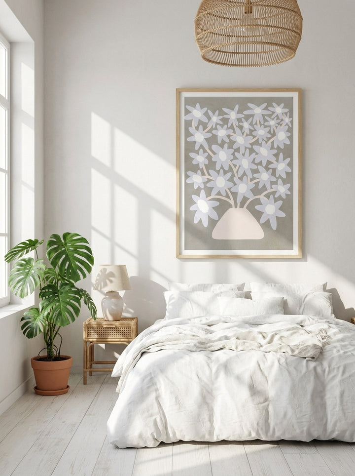Modern wall art print styled on the wall in a bright Scandinavian bedroom