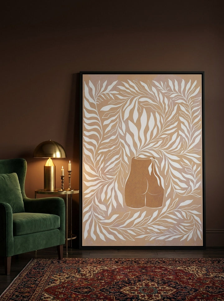 Oversized statement canvas wall art with a black surround leaning against the wall in a moody dining room