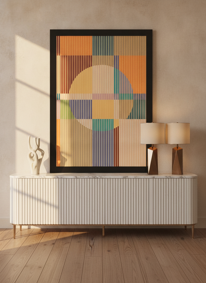 Modern wall art print standing on a sideboard in a luxe bedroom