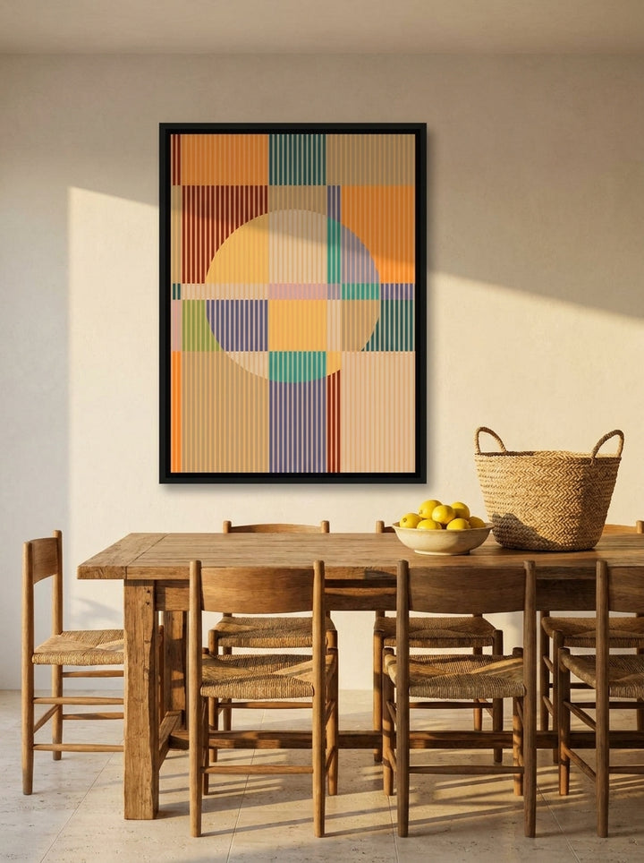 Canvas wall art with a black surround styled on the wall in a Mediterranean dining room