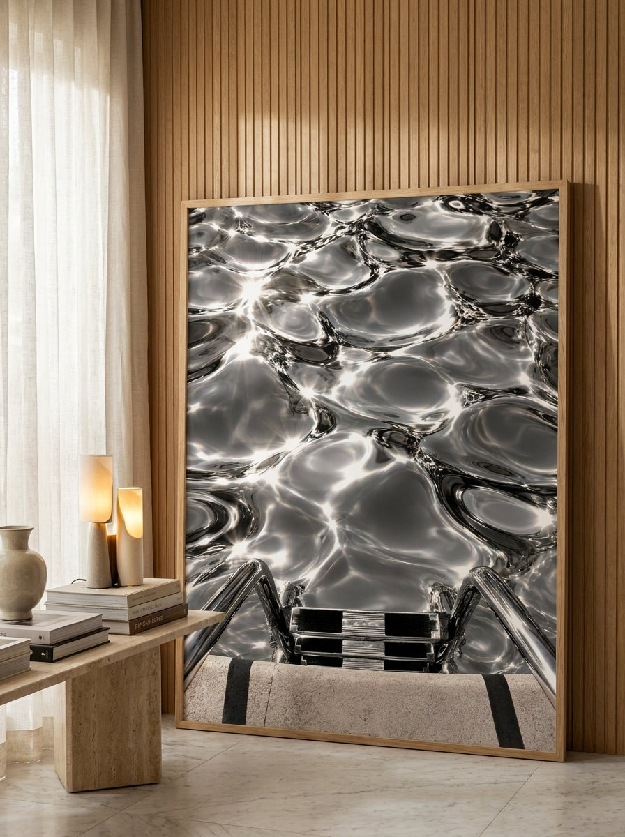 Oversized statement modern wall art print leaning against the wall in a luxe living room