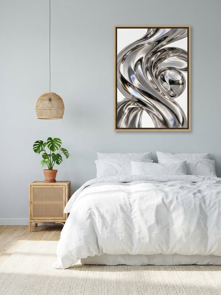 Canvas wall art with a natural timber surround styled on the wall in a bright Scandinavian bedroom