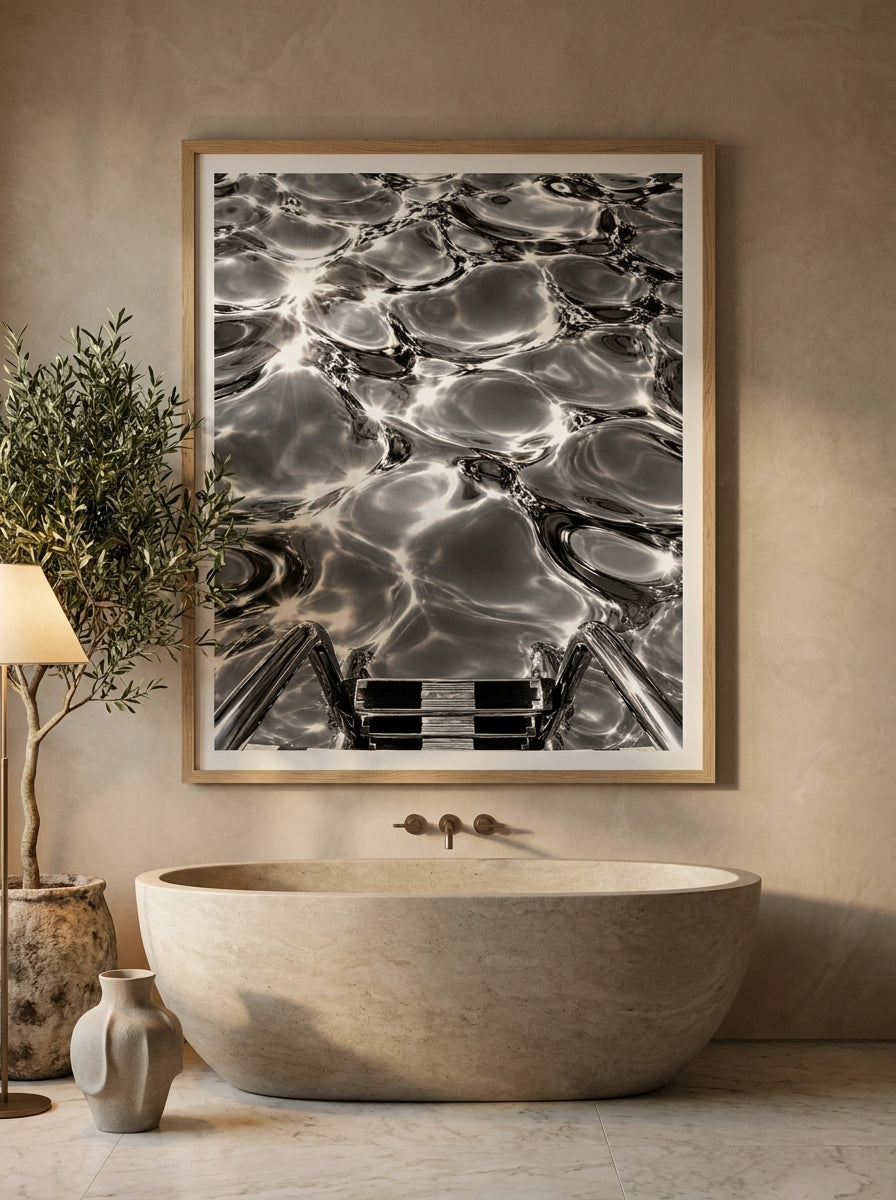Modern wall art print styled on the wall in a luxe bathroom