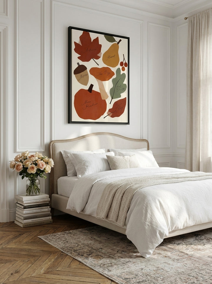 Canvas wall art with a black surround styled on the wall in a Parisian bedroom