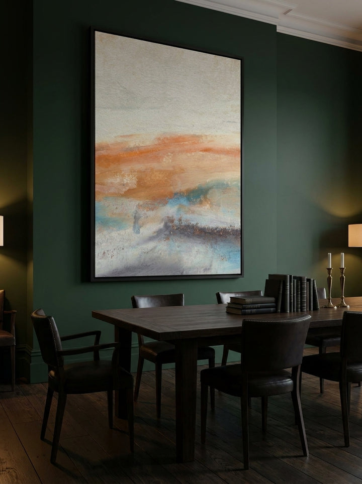 Oversized statement canvas wall art with a black surround styled on the wall in a moody dining room