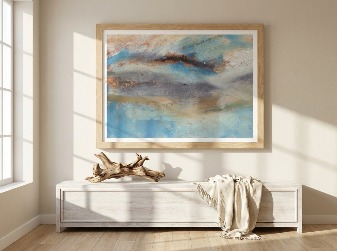 Modern wall art print styled on the wall in a coastal living room