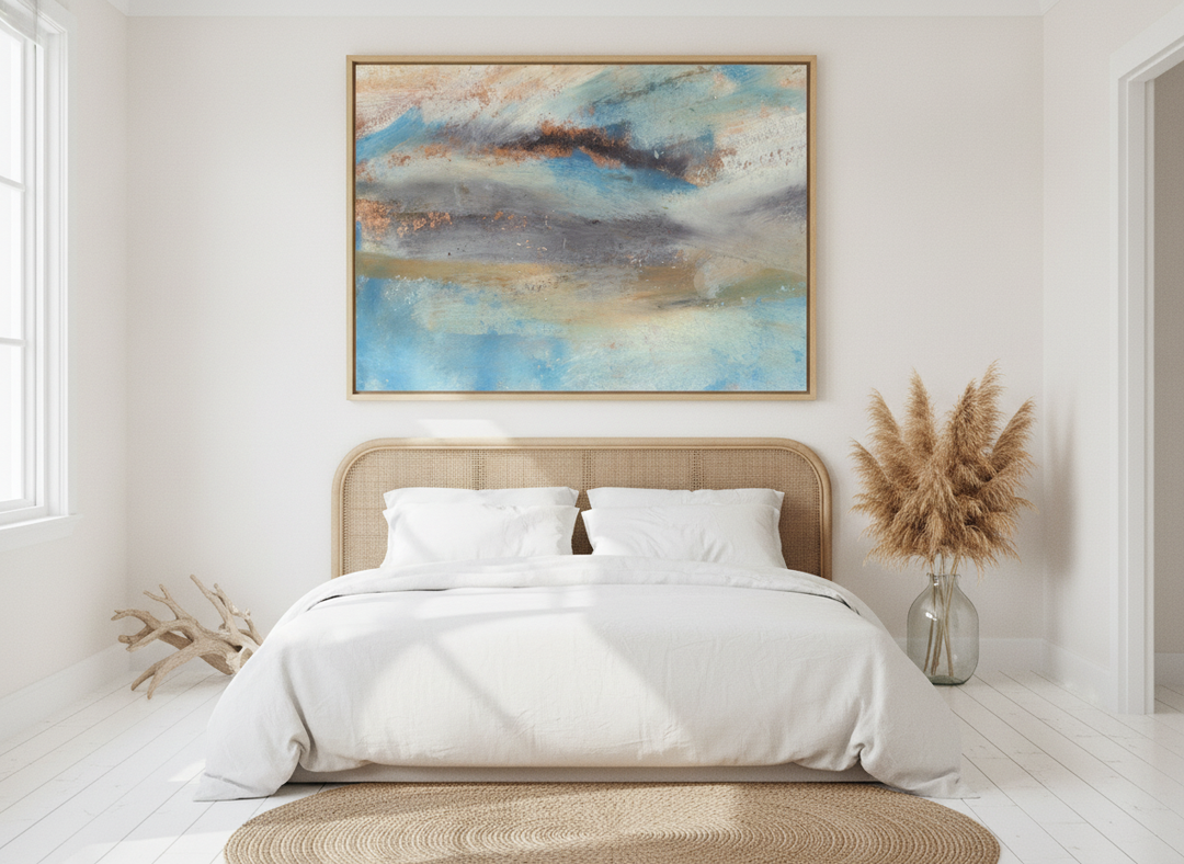 Oversized statement modern wall art print styled on the wall in a coastal bedroom