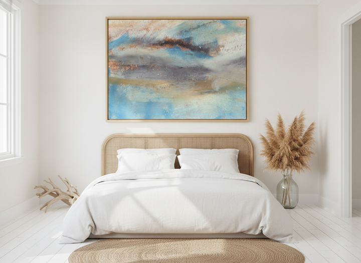 Oversized statement modern wall art print styled on the wall in a coastal bedroom