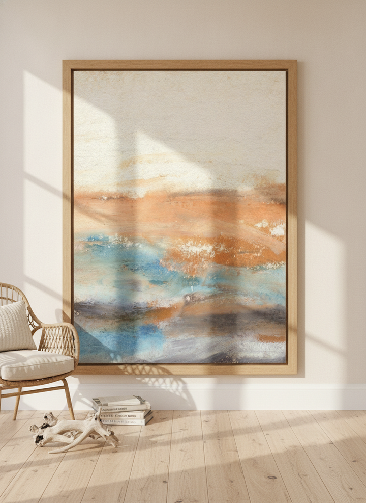 Oversized statement modern wall art print leaning against the wall in a coastal dining room