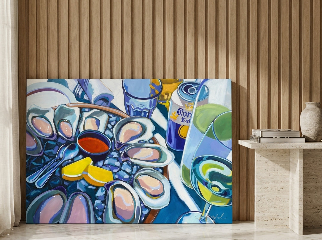 Stretched canvas wall art leaning against the wall in a luxe living room