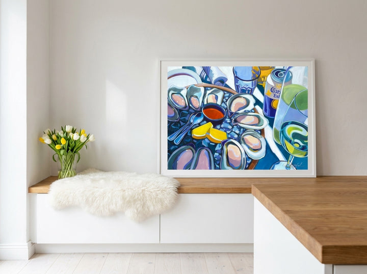 Modern wall art print standing on a kitchen bench in a bright Scandinavian kitchen