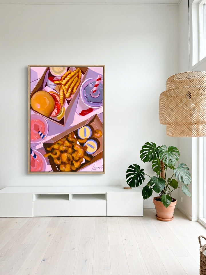 Oversized statement canvas wall art with a natural timber surround styled on the wall in a bright Scandinavian living room