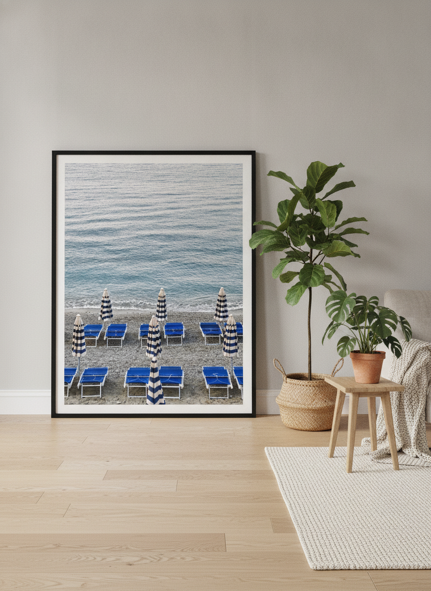 Oversized statement modern wall art print leaning against the wall in a bright Scandinavian living room