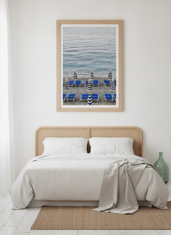 Modern wall art print styled on the wall in a coastal bedroom