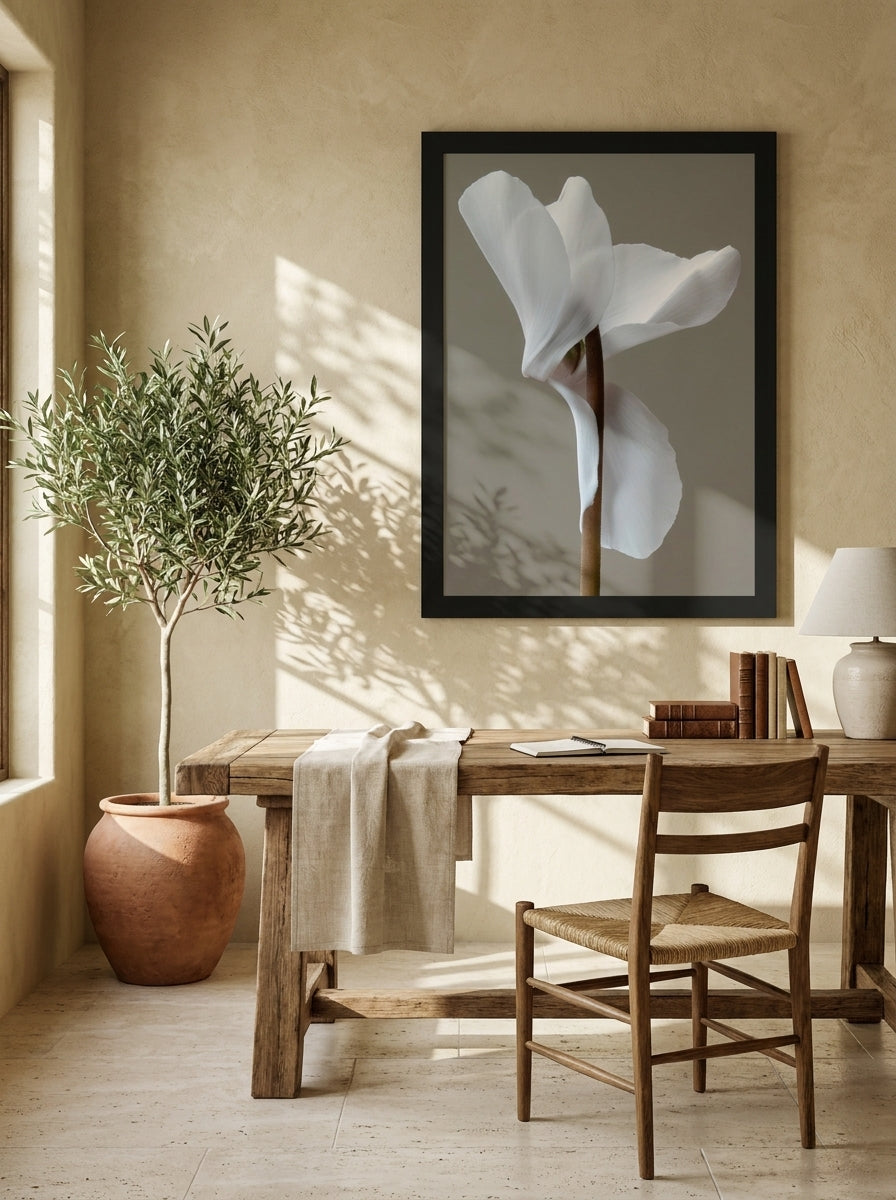 Modern wall art print styled on the wall in a Mediterranean home office