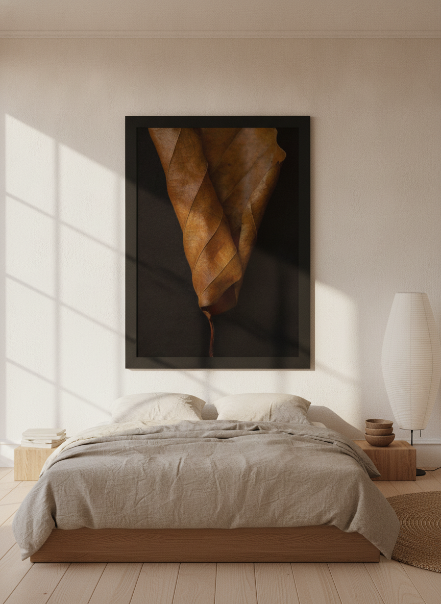 Oversized statement modern wall art print styled on the wall in a warm Japandi bedroom