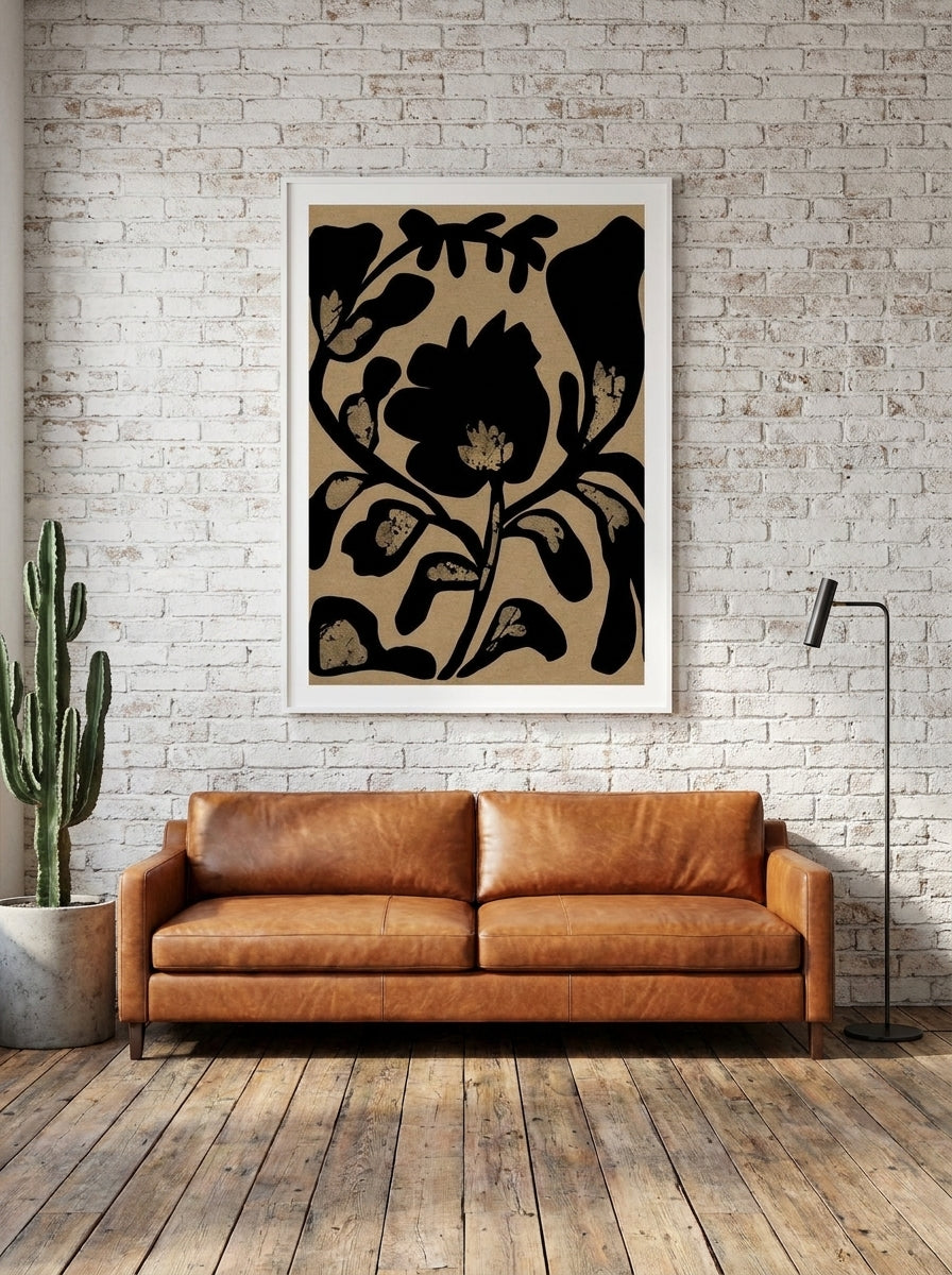 Modern wall art print styled on the wall in an industrial loft living room