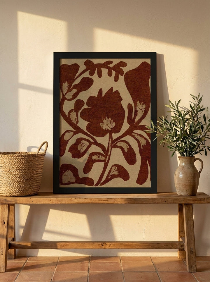 Modern wall art print standing on a bench in a Mediterranean bedroom