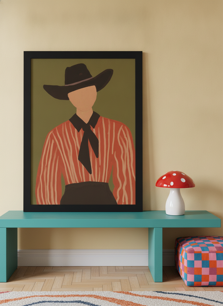 Modern wall art print standing on a side table in a colourful eclectic home office