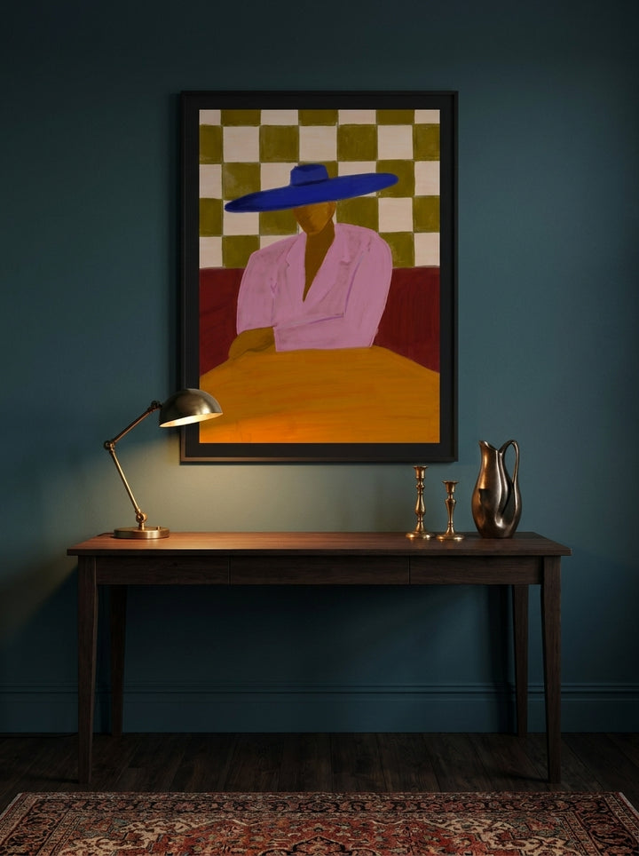 Modern wall art print styled on the wall in a moody home office