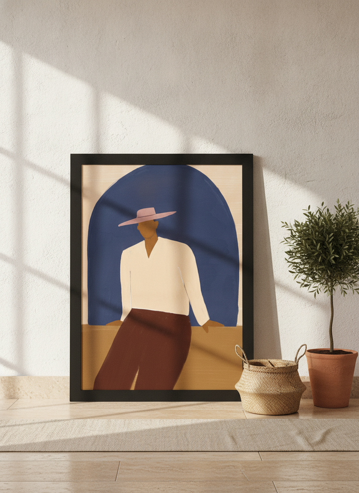 Oversized statement modern wall art print leaning against the wall in a Mediterranean bedroom