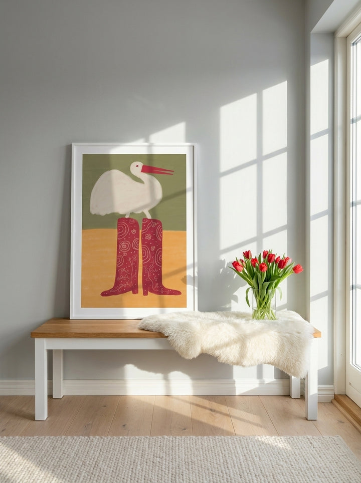 Modern wall art print standing on a kitchen bench in a bright Scandinavian kitchen