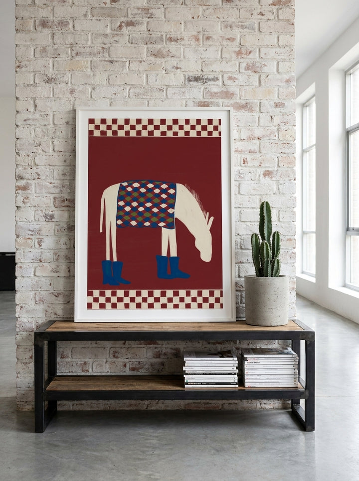 Modern wall art print standing on a console in an industrial loft living room