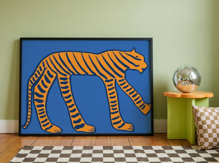 Oversized statement modern wall art print leaning against the wall in a colourful eclectic nursery