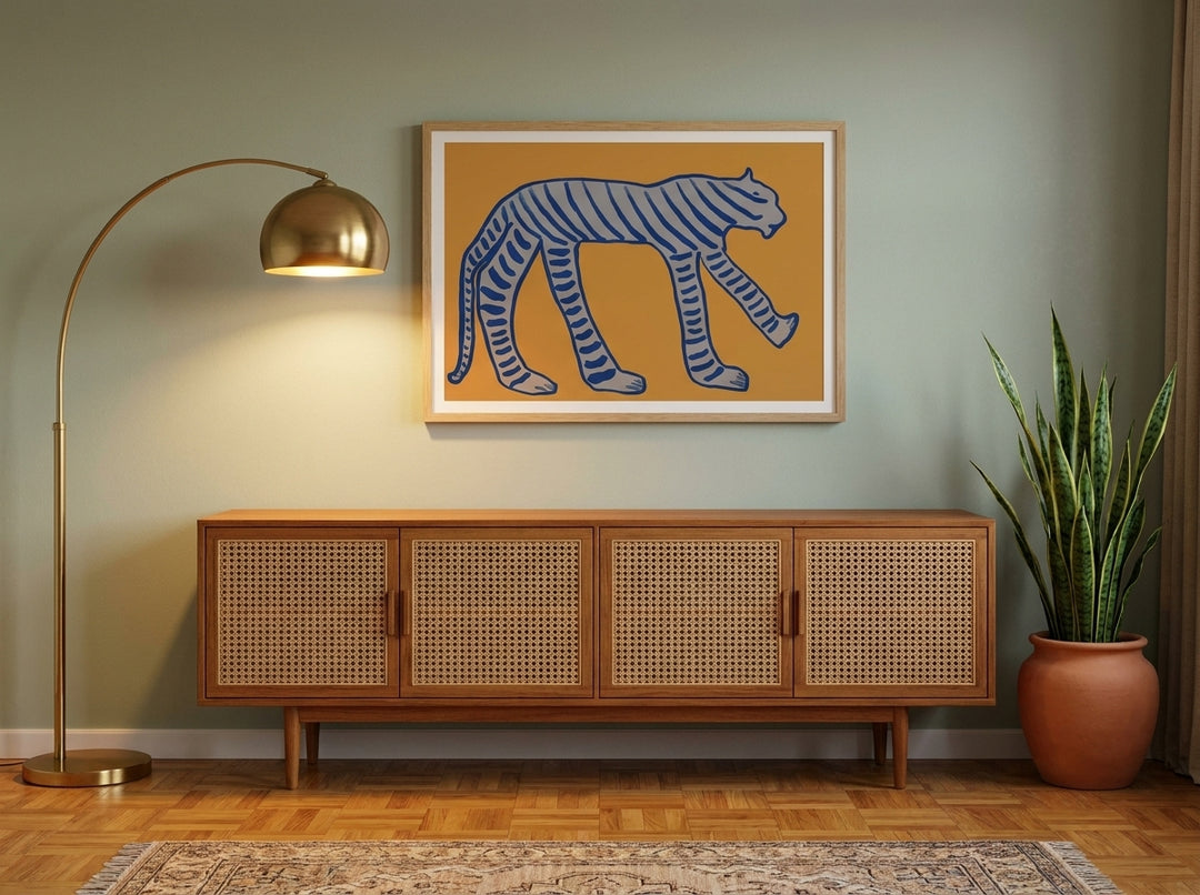 Modern wall art print styled on the wall in a mid-century living room