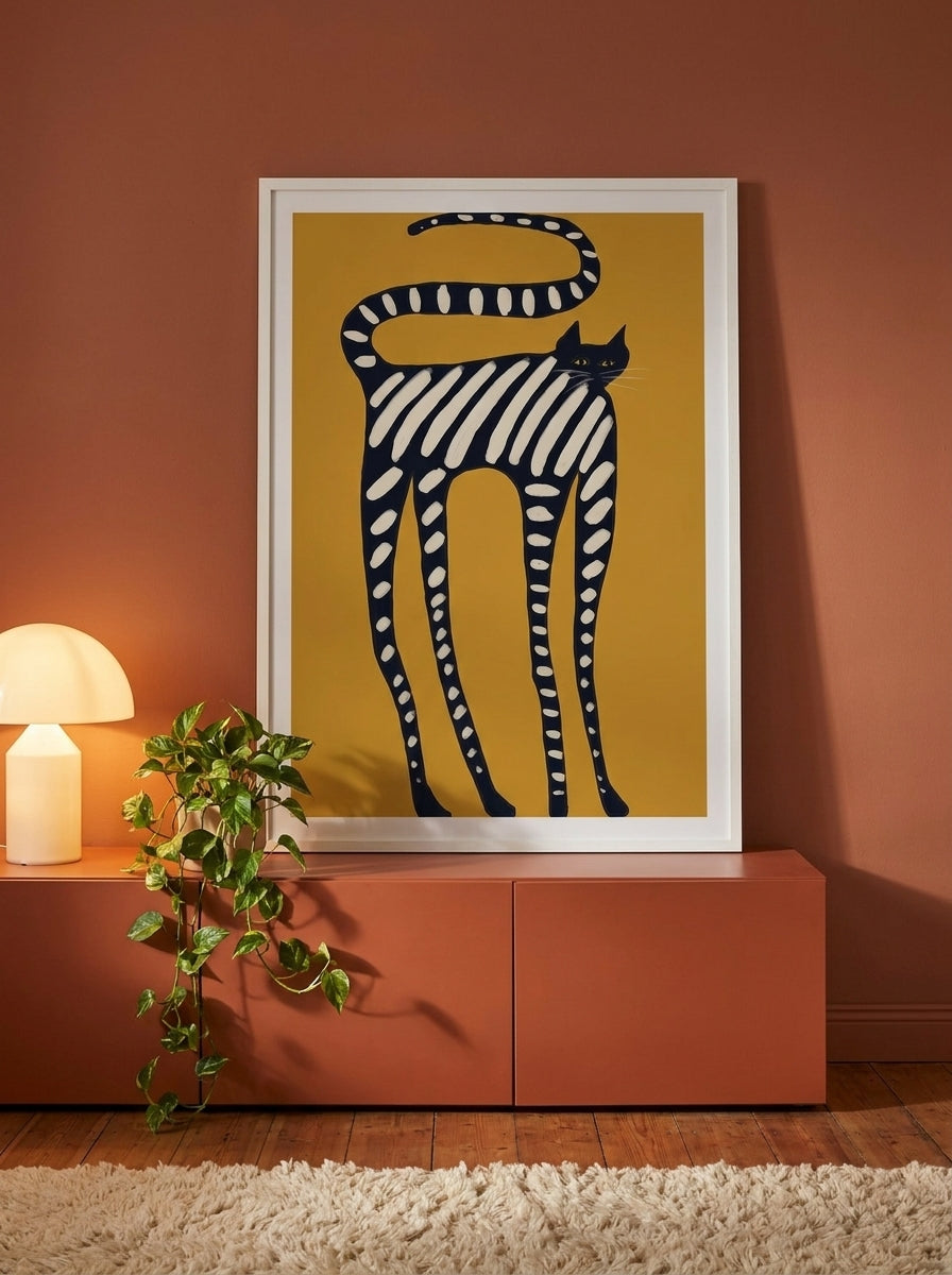 Modern wall art print standing on a sideboard in a retro 70s bedroom