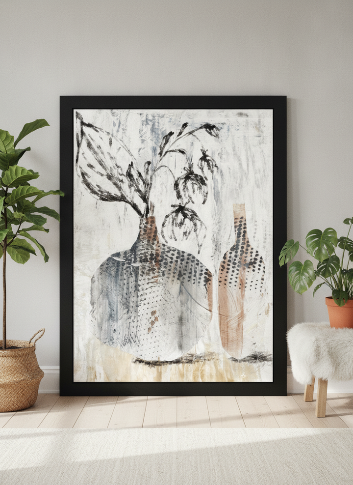 Oversized statement modern wall art print leaning against the wall in a bright Scandinavian dining room
