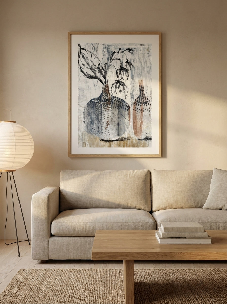 Modern wall art print styled on the wall in a warm Japandi living room