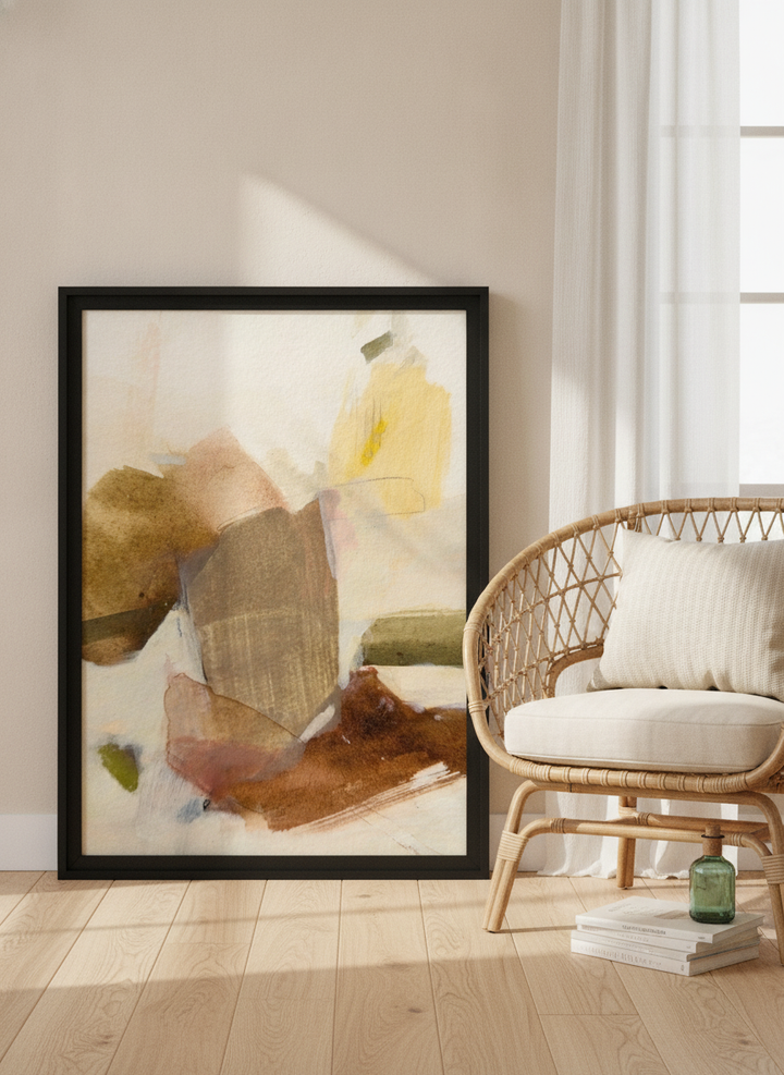 Modern wall art print leaning against the wall in a coastal living room