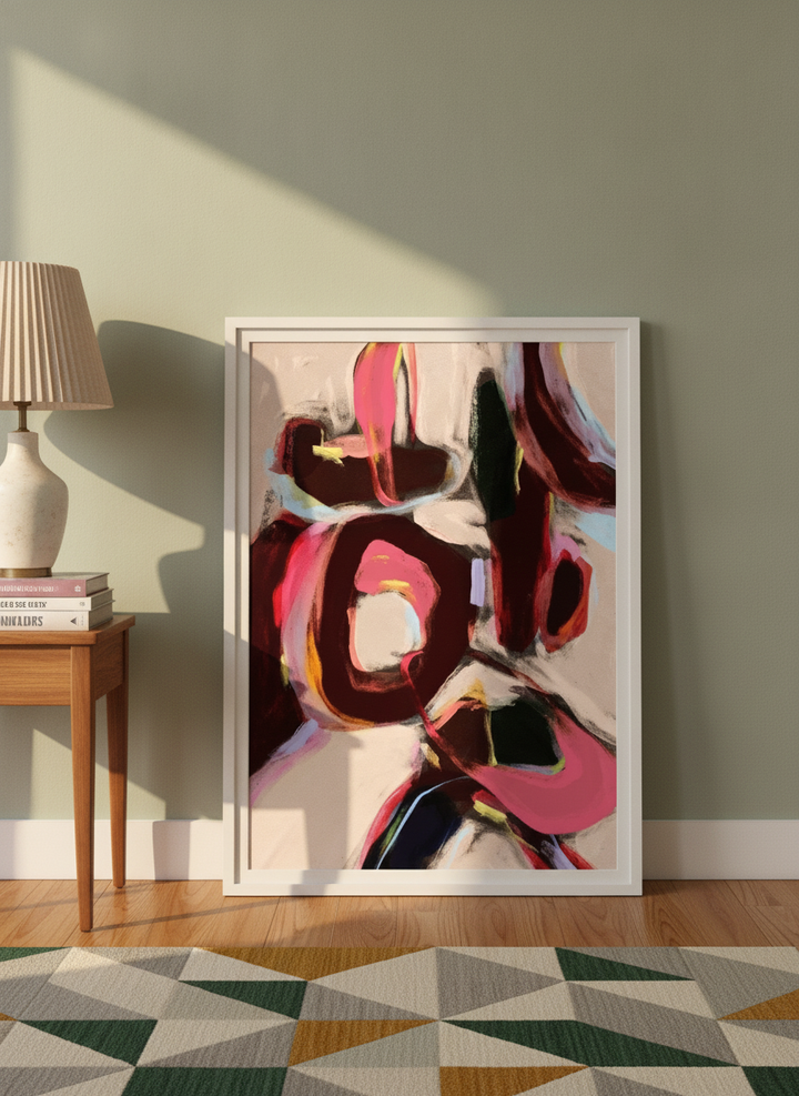 Modern wall art print leaning against the wall in a mid-century home office