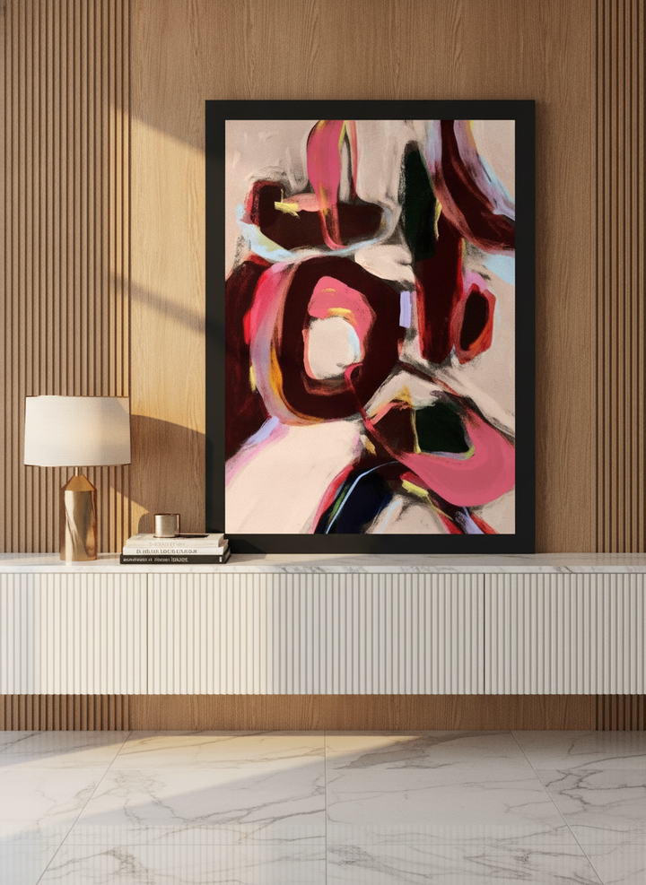 Modern wall art print standing on a sideboard in a luxe bedroom
