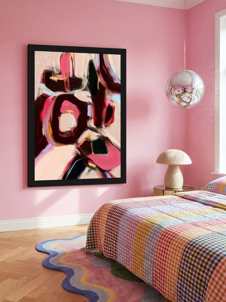 Modern wall art print styled on the wall in a colourful eclectic bedroom