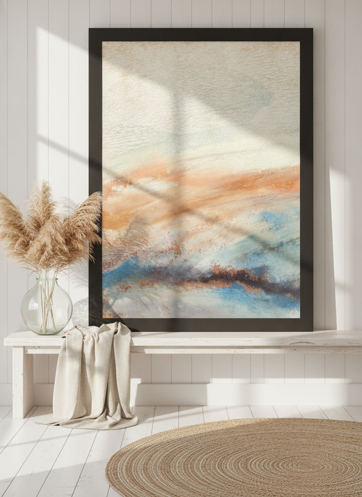Modern wall art print standing on a console in a coastal bedroom