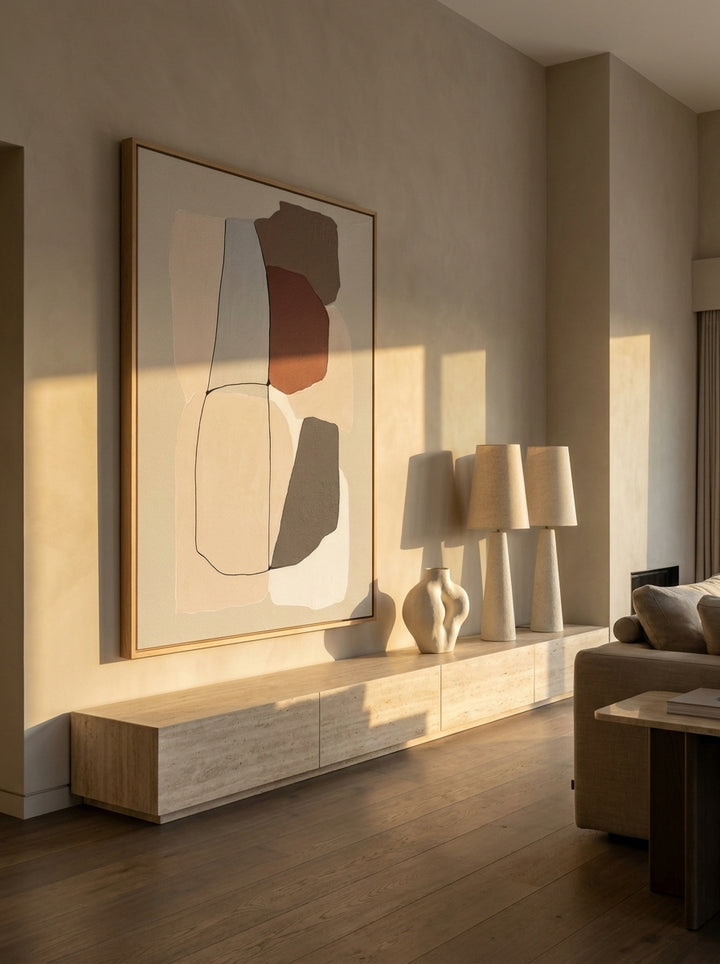 Oversized statement modern wall art print styled on the wall in a luxe living room