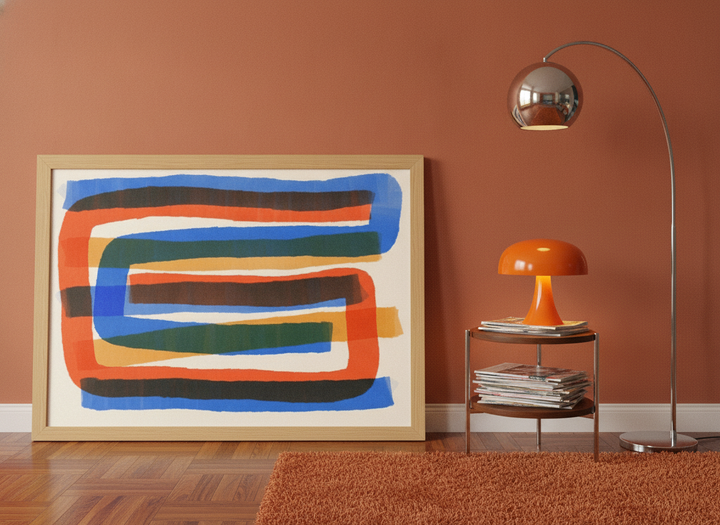 Modern wall art print leaning against the wall in a retro 70s dining room
