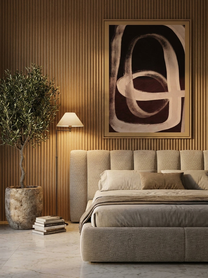 Oversized statement modern wall art print styled on the wall in a luxe bedroom