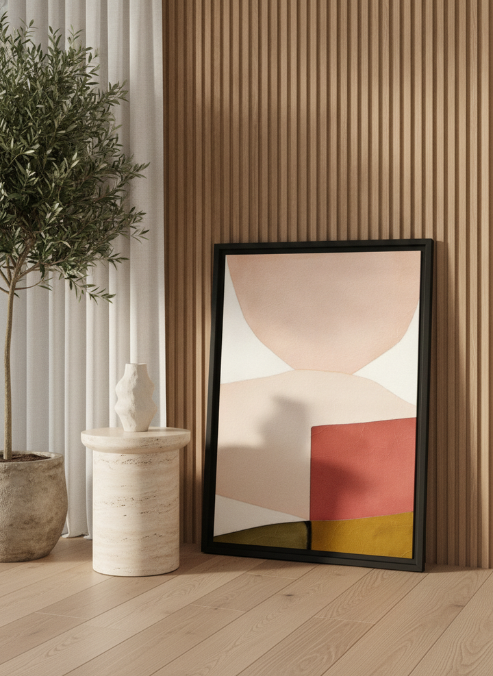 Modern wall art print leaning against the wall in a luxe living room